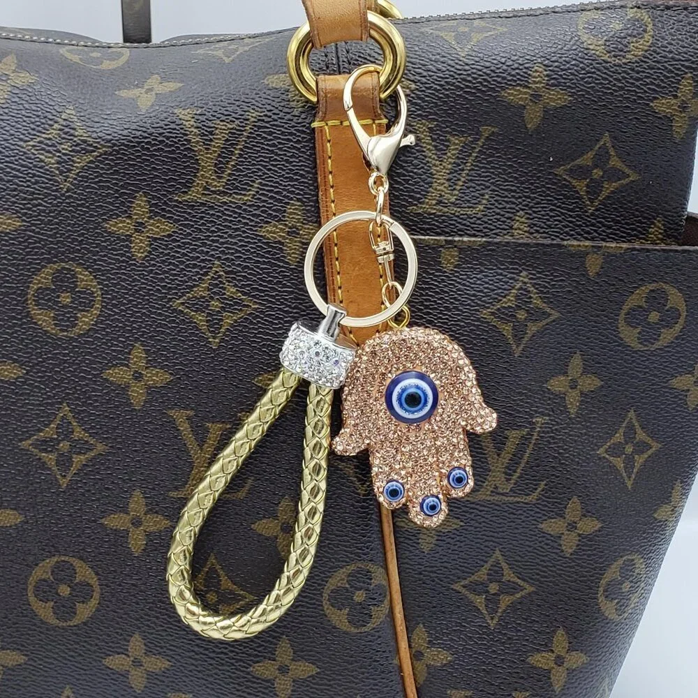Authentic Louis Vuitton Lock & Key with unbranded Evil Eye Bagcharm 011526